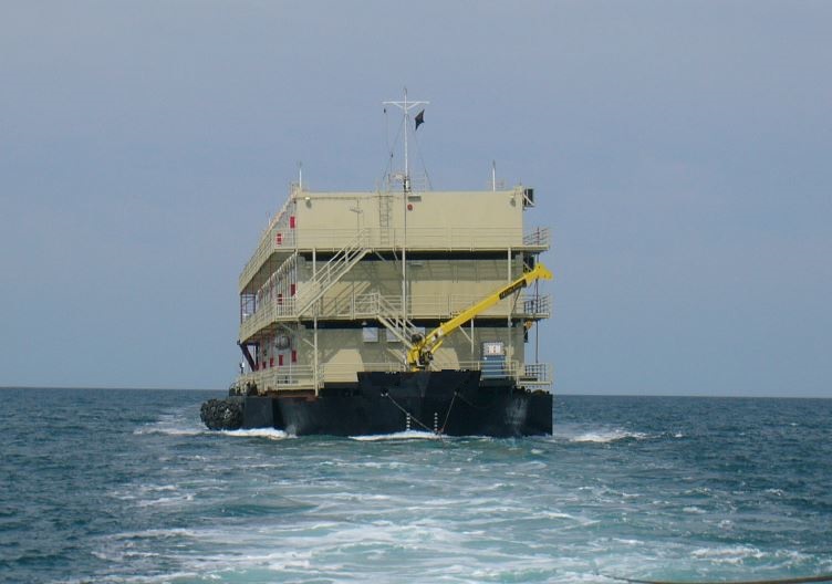 accommodation barge being towed