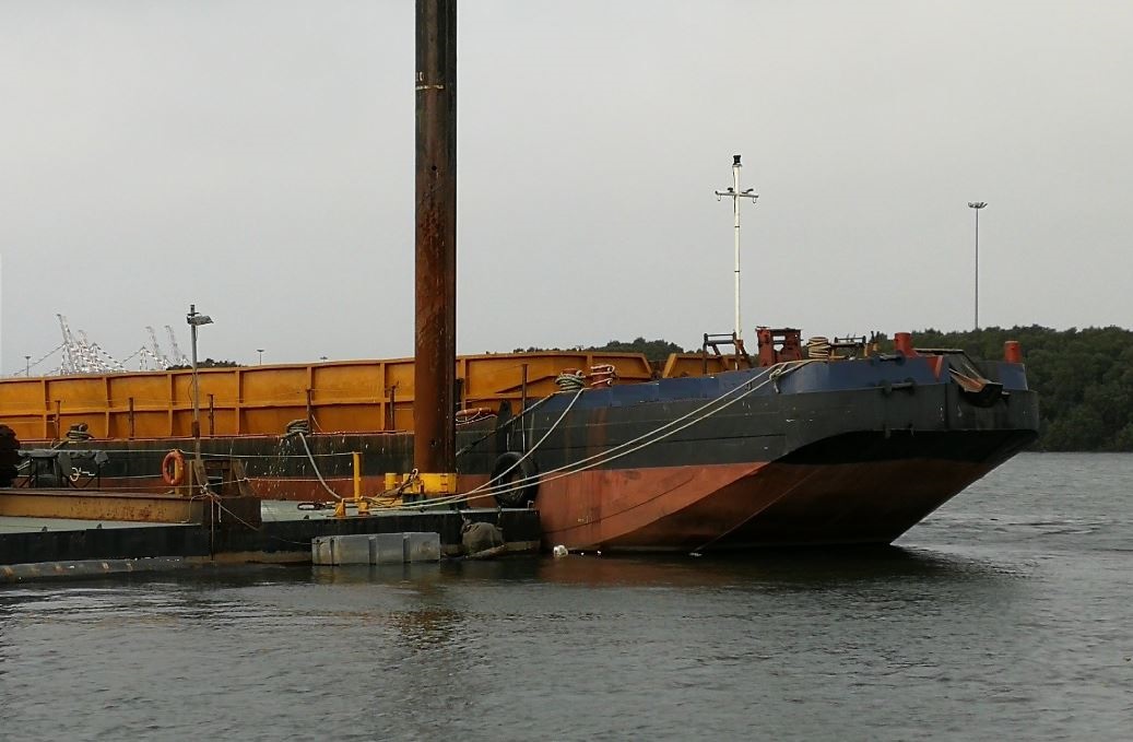 moored split hopper barge